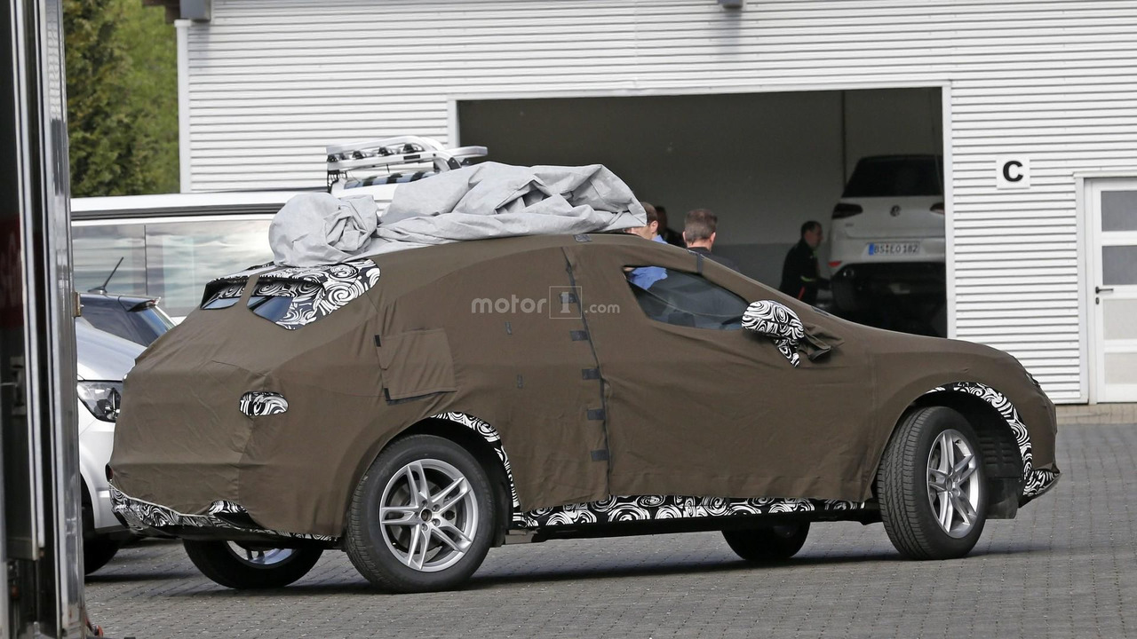 http://icdn-3.motor1.com/images/mgl/Wyggo/s3/2018-audi-q3-spy-photo.jpg 2018-audi-q3-spy-photo